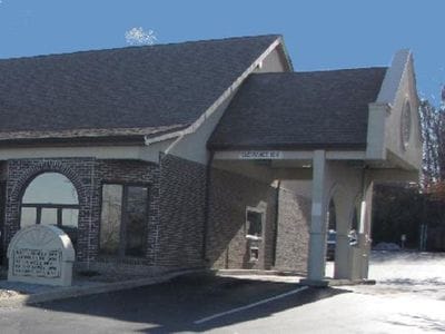 Brick exterior of the Blount Discount Pharmacy Gill Street location